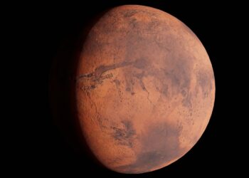 Siyah arka plan önünde duran turuncu tonlarındaki Mars gezegeni.