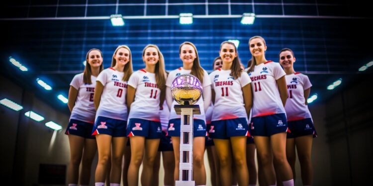 Kupa kazanan ve arkalarında mavi ışıklar bulunan voleybolcu kadınlar